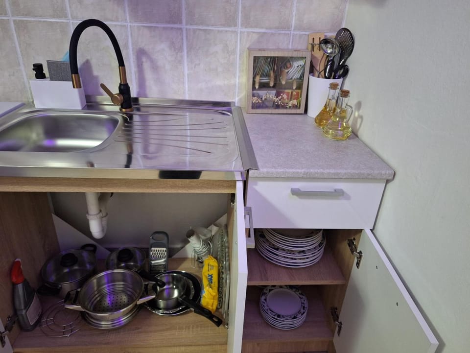 Kitchen or kitchenette, stove