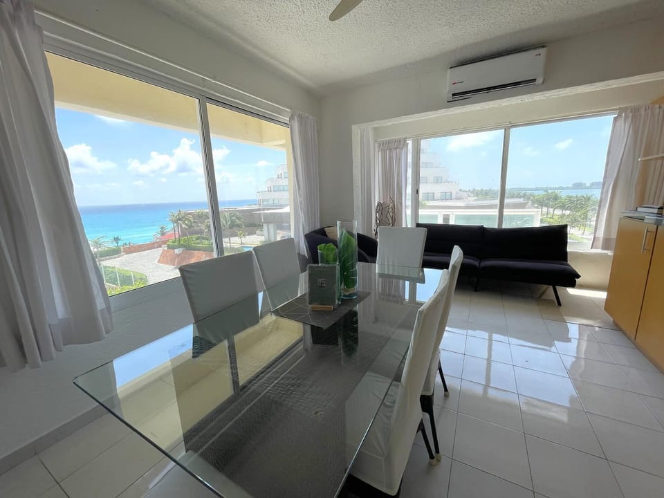 Natural landscape, View (from property/room), Living room, Seating area, Dining area, Sea view