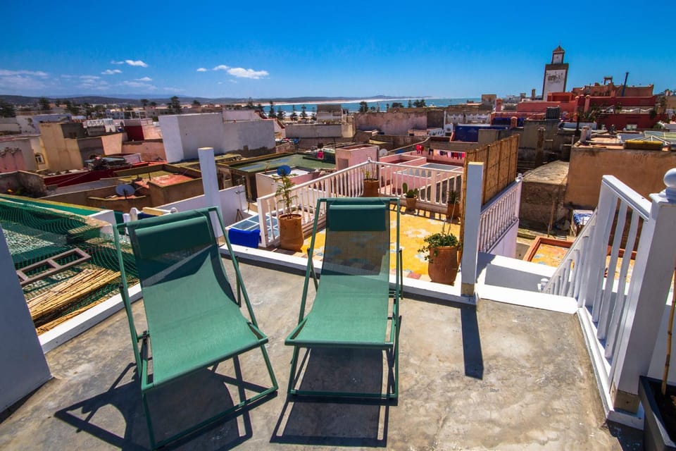 Property building, Patio, Communal lounge/ TV room, Day, Natural landscape, View (from property/room), Balcony/Terrace, Living room, Seating area, Dining area, Evening entertainment, City view, Sea view