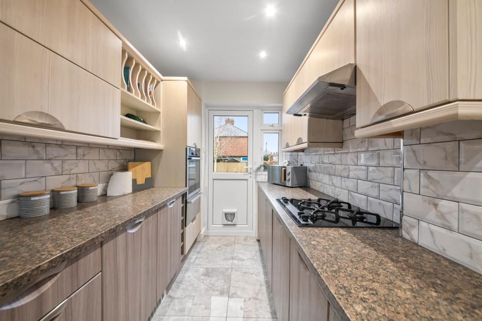 Kitchen or kitchenette, oven, stove, toaster