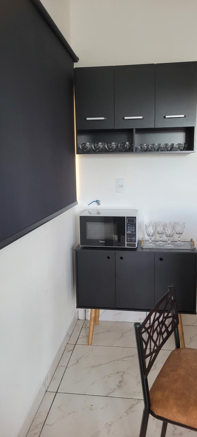 Kitchen or kitchenette, microwave