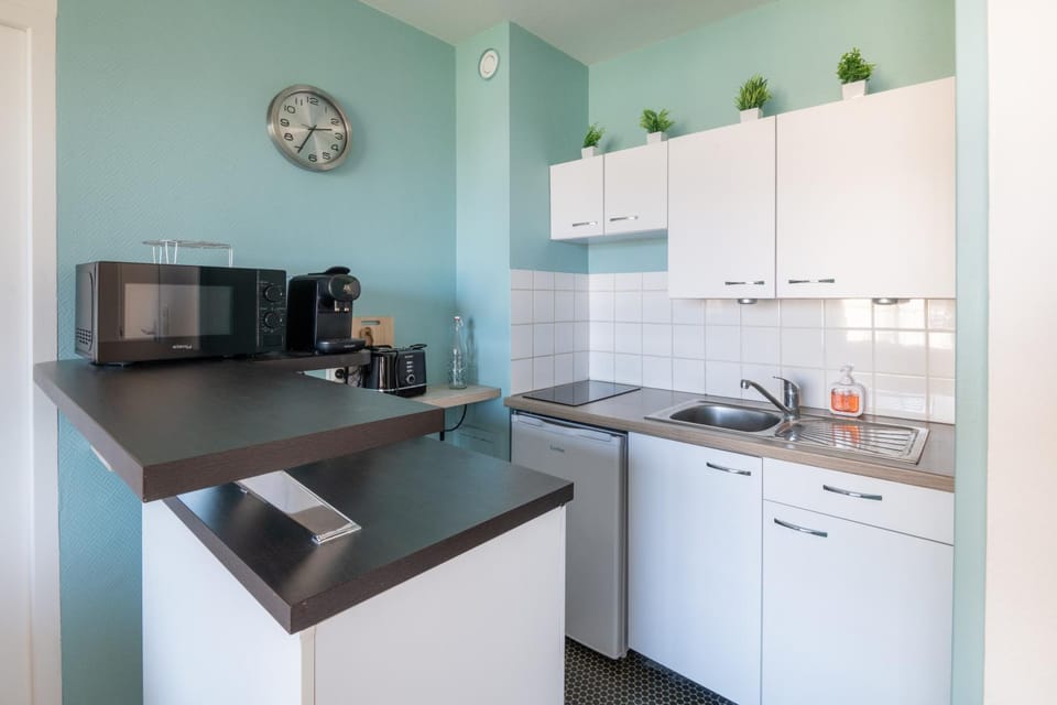 Kitchen or kitchenette, stove