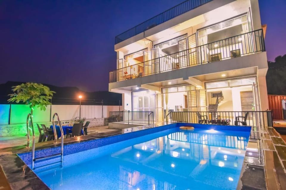 Property building, Patio, Night, View (from property/room), Balcony/Terrace, Pool view, Swimming pool, sunbed