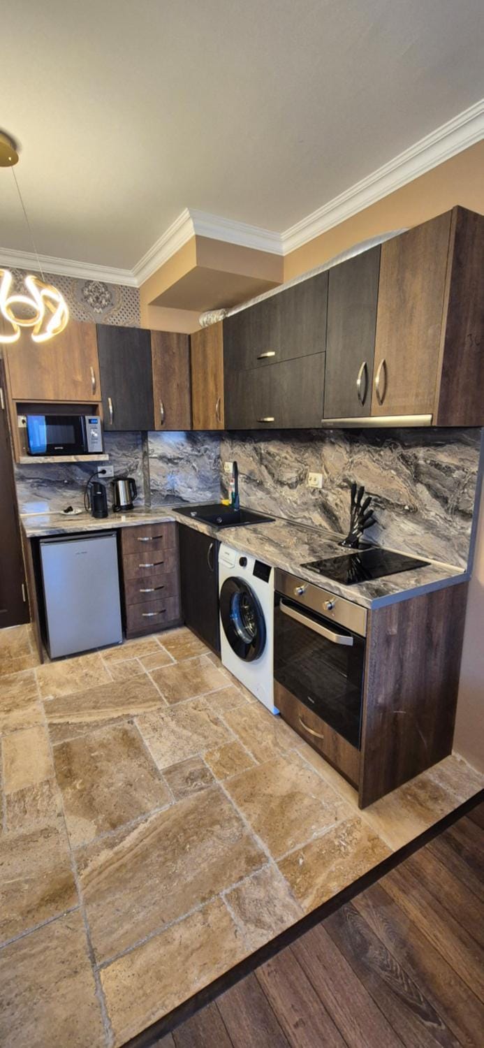 Kitchen or kitchenette, oven, stove