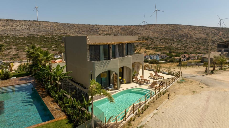 Property building, Day, Natural landscape, Pool view, Swimming pool, sunbed