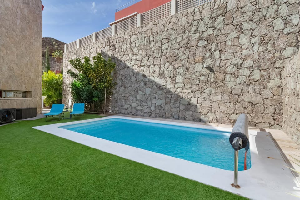 Property building, Living room, Swimming pool