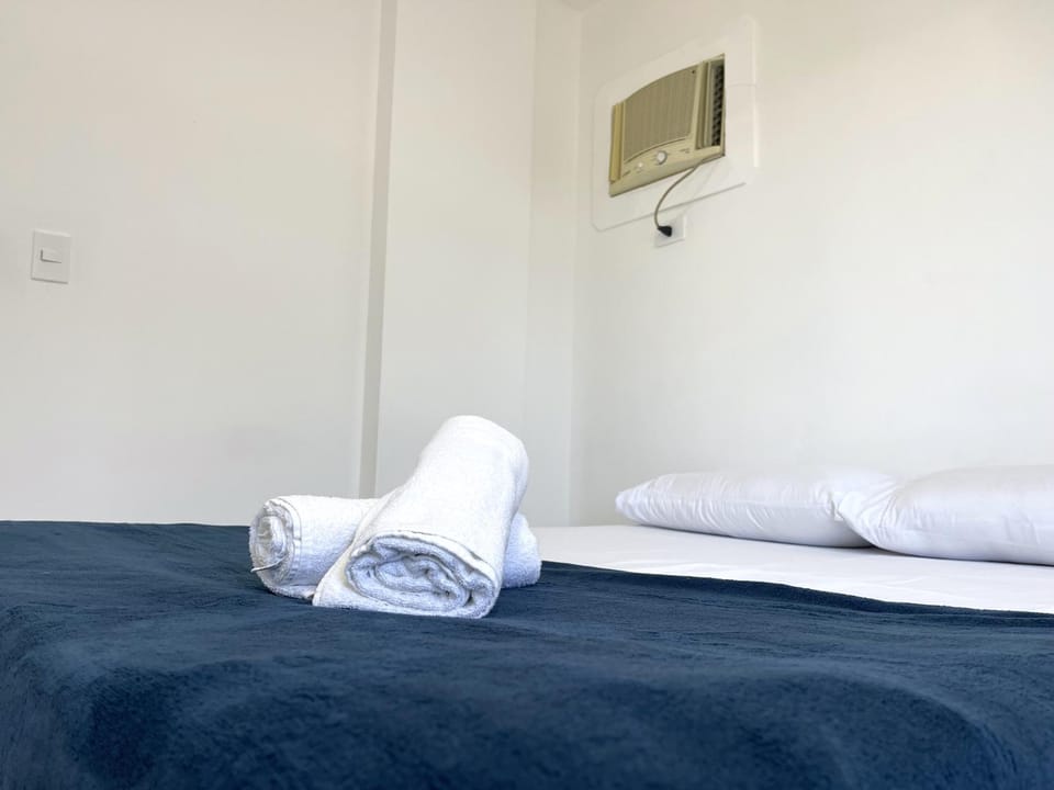 Bed, Photo of the whole room, Bedroom, towels, air conditioner
