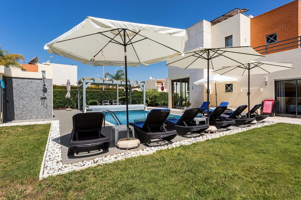 Property building, Living room, Swimming pool