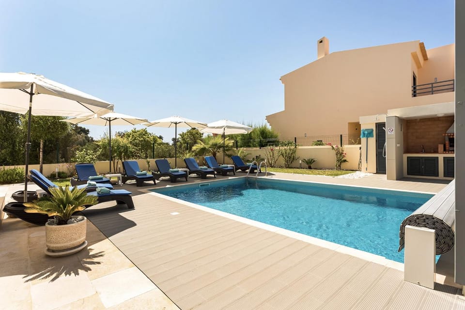 Property building, Living room, Swimming pool