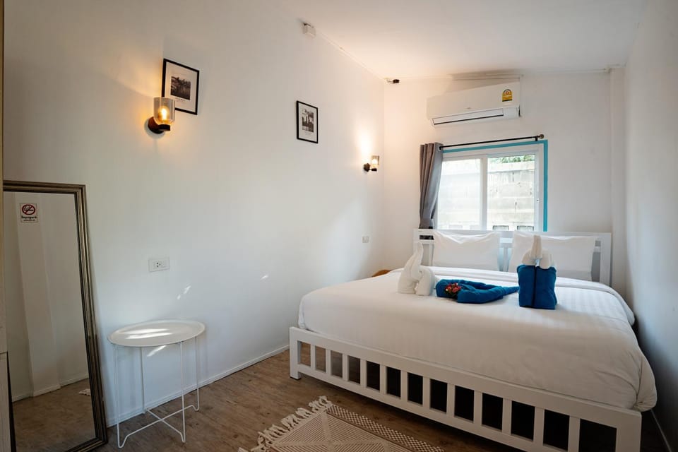 Bed, Photo of the whole room, Bedroom, towels, air conditioner