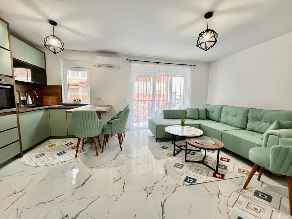 Kitchen or kitchenette, Living room, Seating area, Dining area