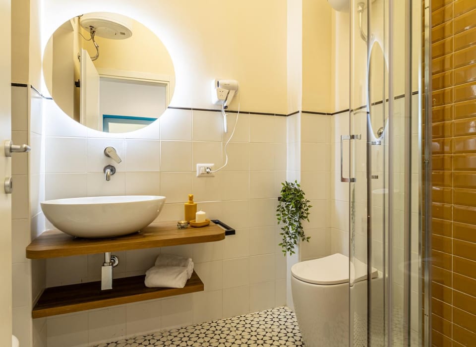 Shower, Toilet, Bathroom, bidet, hair dryier, towels