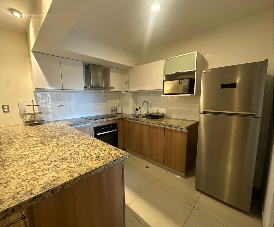Kitchen or kitchenette, oven