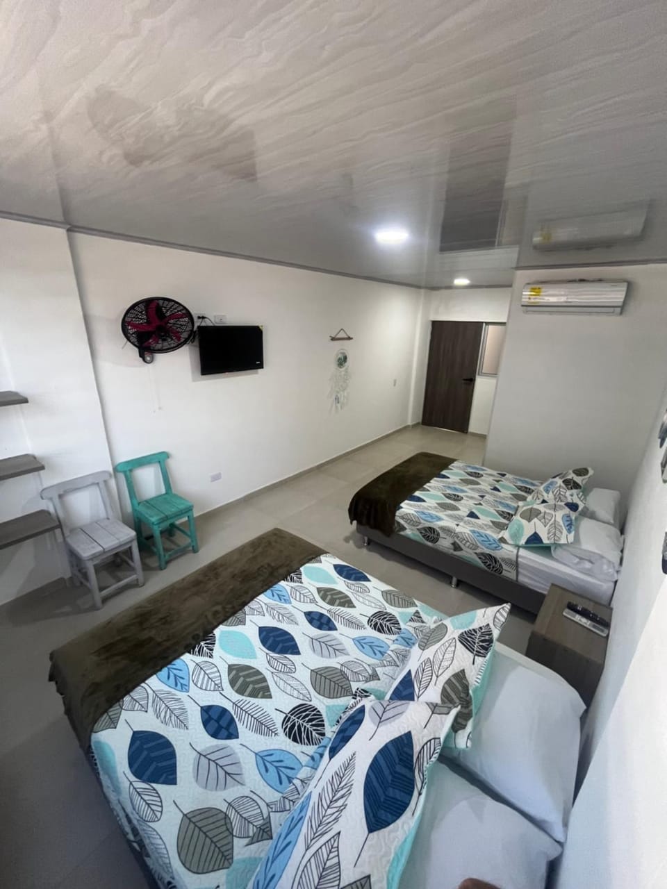 Photo of the whole room, air conditioner