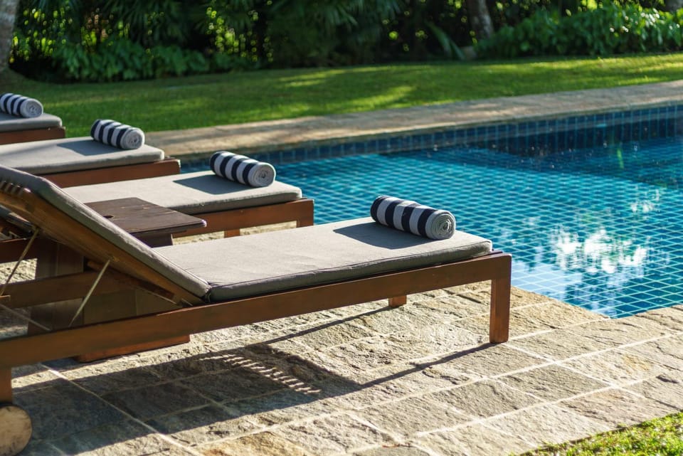 Swimming pool, sunbed