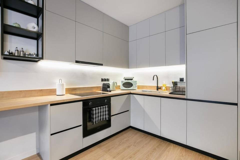 Coffee/tea facilities, Kitchen or kitchenette, dishwasher, microwave, minibar, oven, stove, toaster