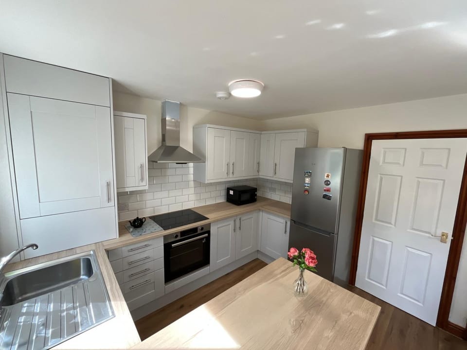 Kitchen or kitchenette, oven, stove, toaster