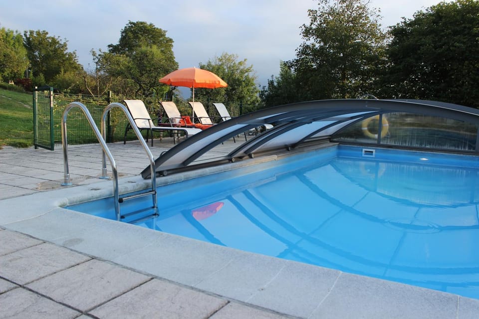 Property building, Living room, Swimming pool
