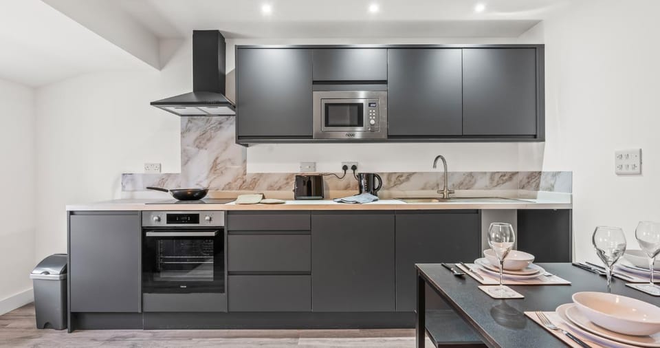 Kitchen or kitchenette, stove, toaster