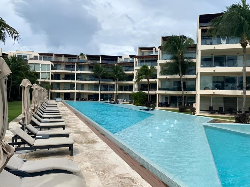 Property building, Day, View (from property/room), Pool view, Swimming pool, sunbed