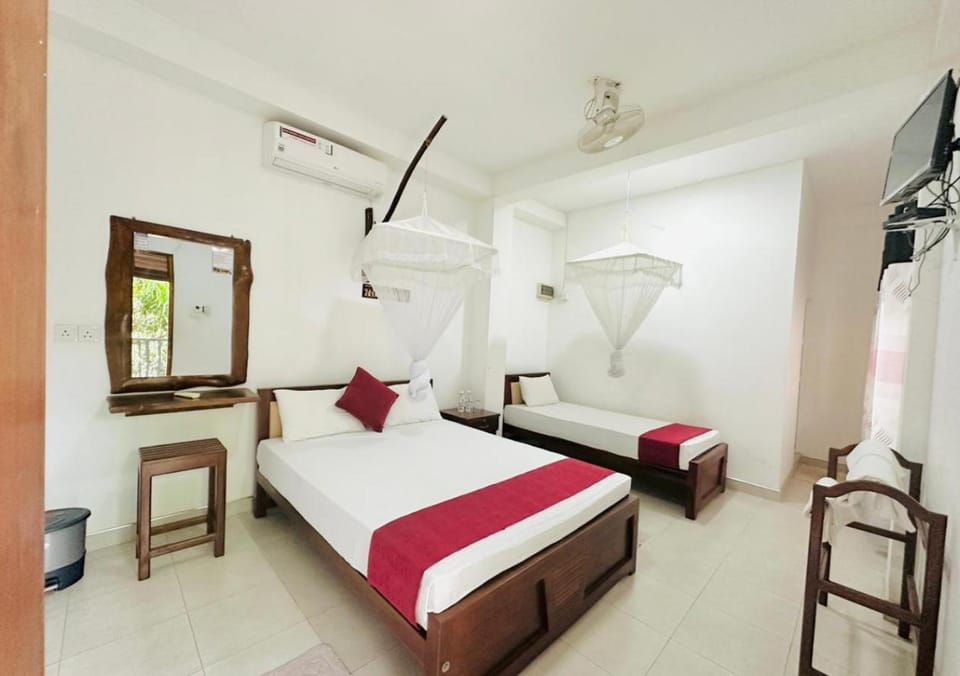 Bed, TV and multimedia, Bedroom, fireplace, towels, air conditioner