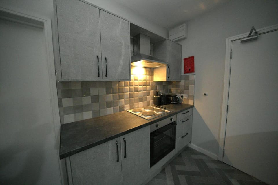 Kitchen or kitchenette, oven, stove