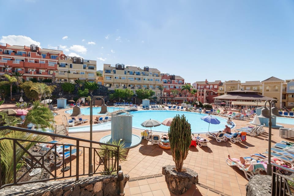Property building, Living room, Swimming pool