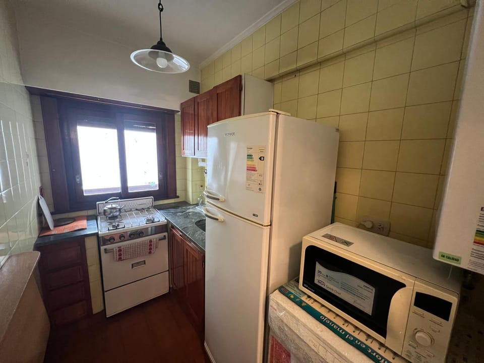 Kitchen or kitchenette, microwave, oven