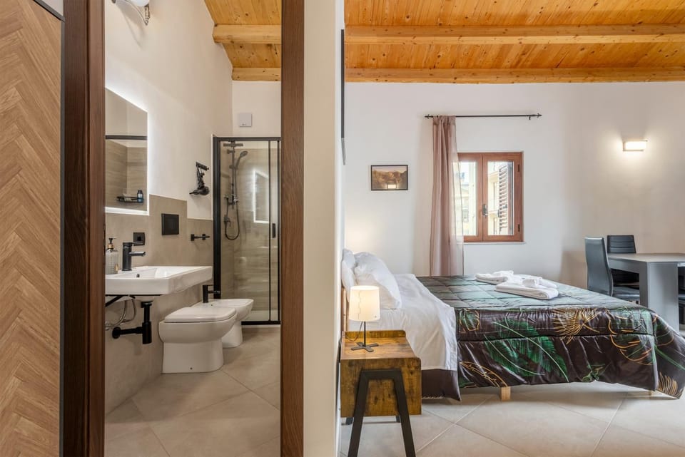 Toilet, Bed, Bathroom, Photo of the whole room, Bedroom, hair dryier, towels