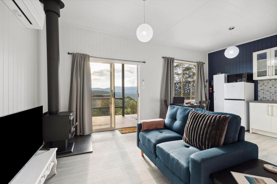 TV and multimedia, Living room, Seating area, Mountain view, fireplace