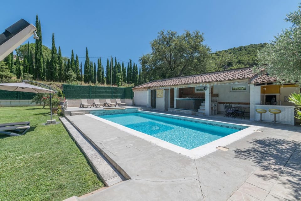 Property building, Living room, Swimming pool