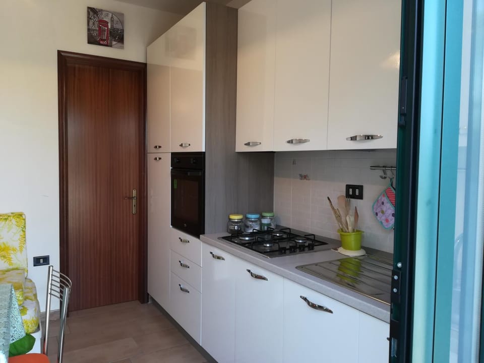 Kitchen or kitchenette, stove