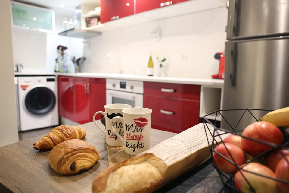 Kitchen or kitchenette, dishwasher, oven, stove, washing machine, dryer