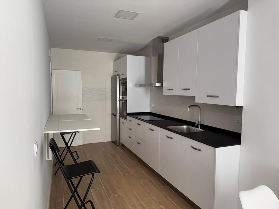Kitchen or kitchenette, oven, stove