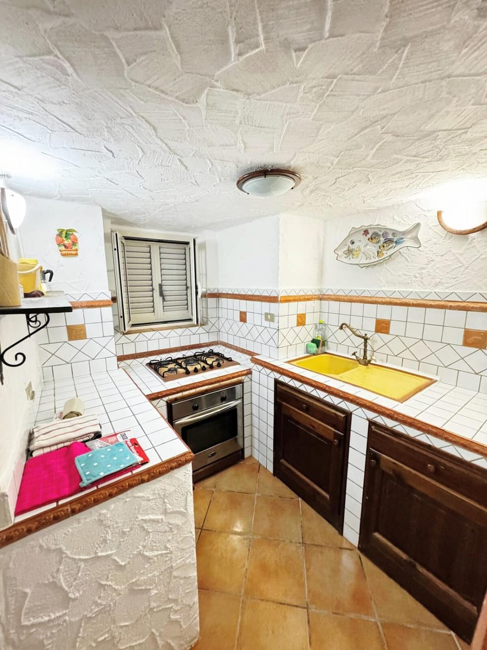 Kitchen or kitchenette, oven, stove