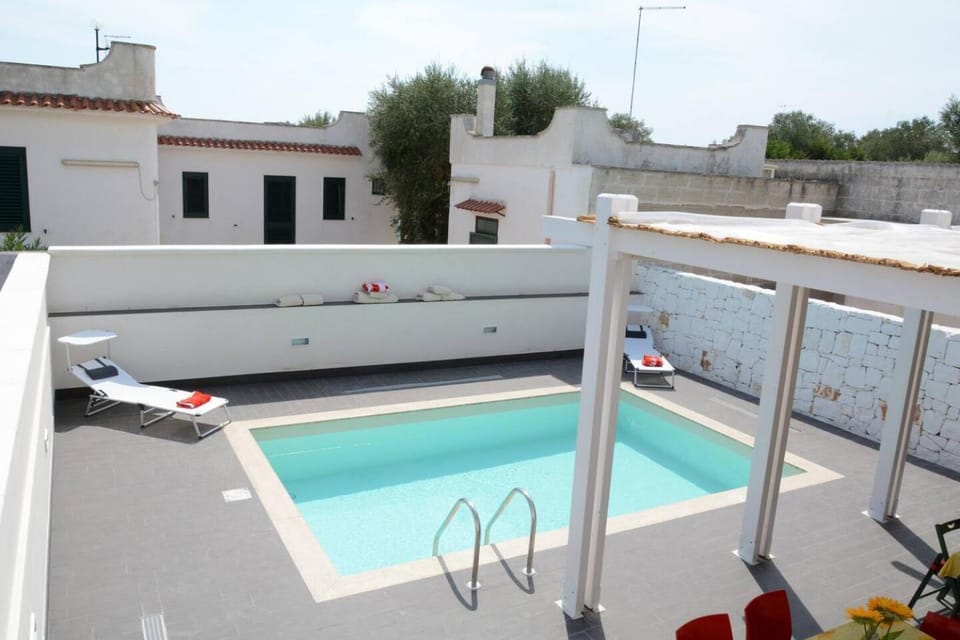Patio, Day, Pool view, Swimming pool, sunbed