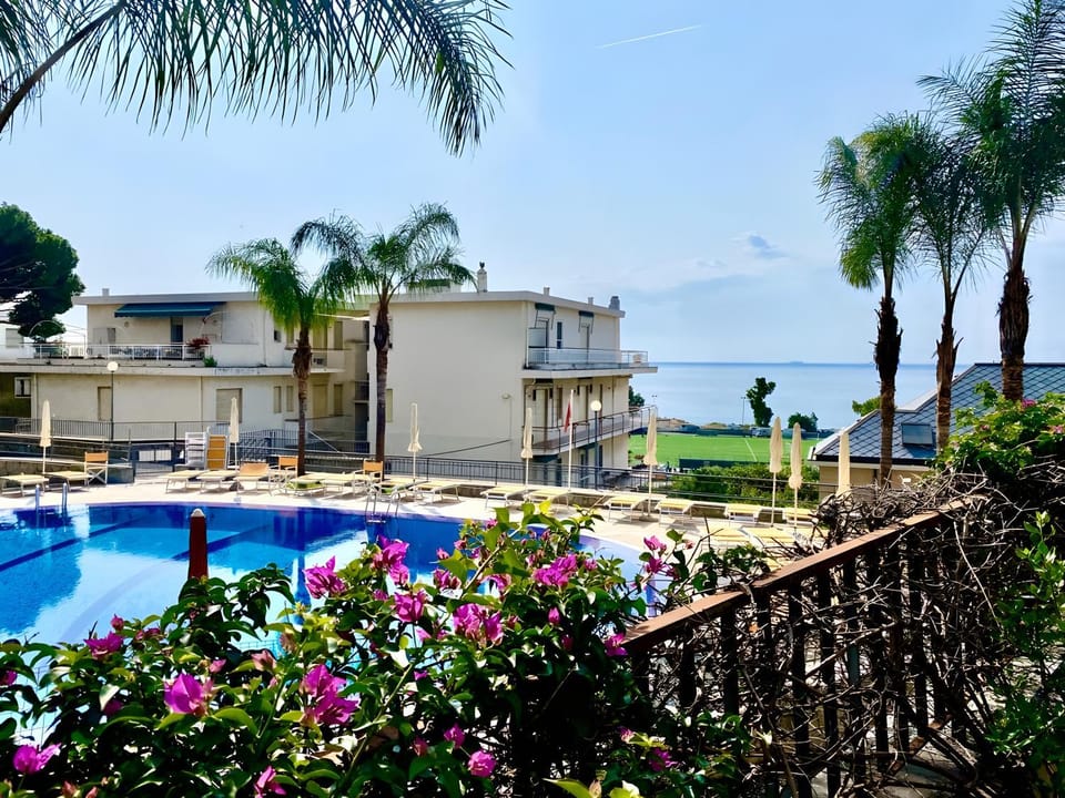 Property building, Living room, Swimming pool