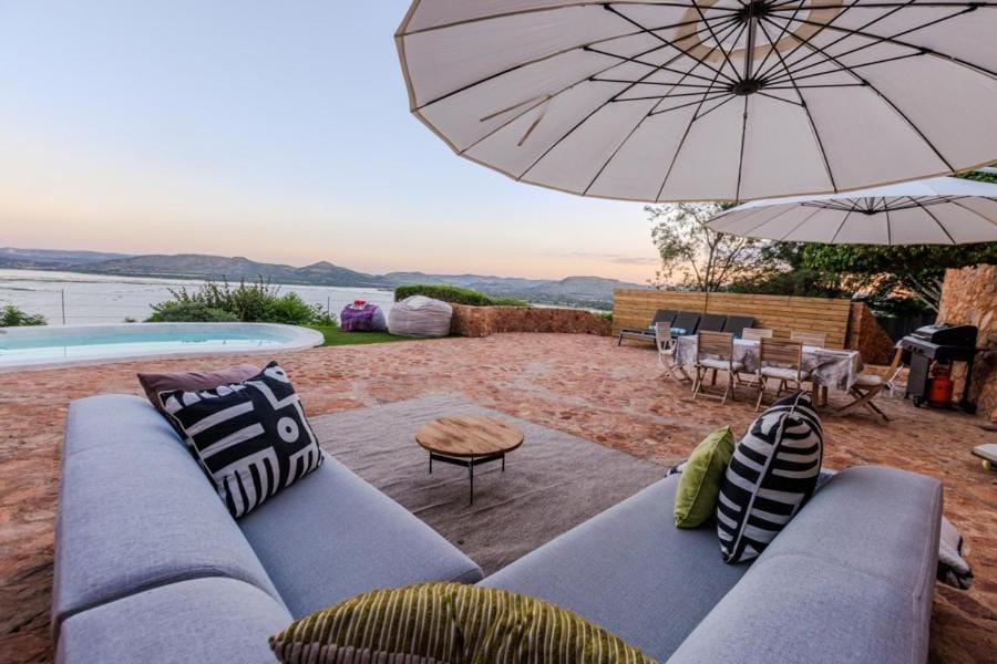 Natural landscape, Balcony/Terrace, Seating area, Lake view, Mountain view, Pool view, Swimming pool