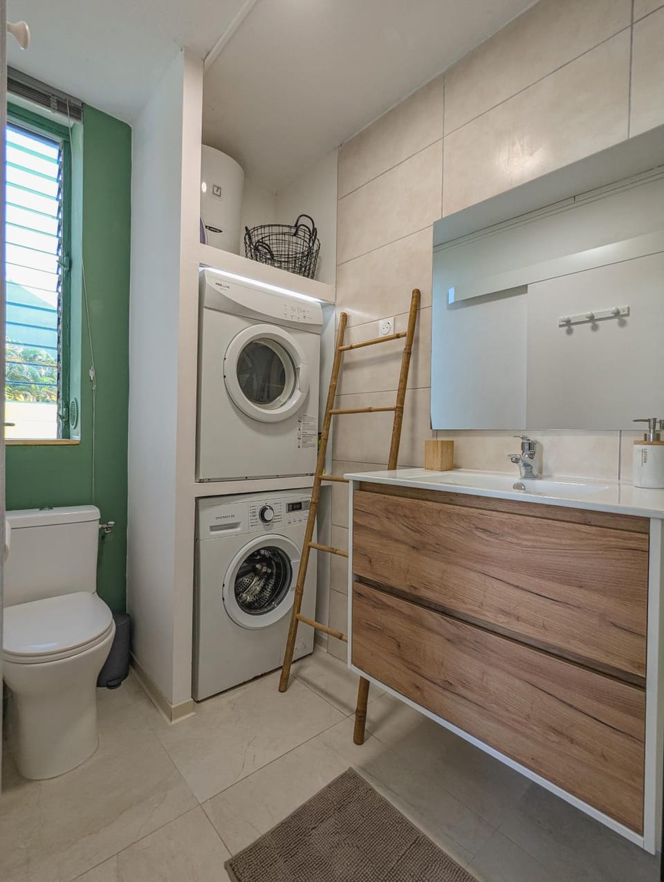 Shower, Toilet, Bathroom, hair dryier, towels, washing machine, dryer