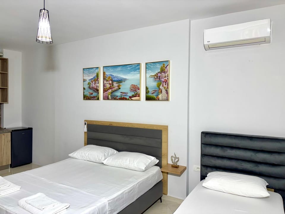 Bed, Photo of the whole room, Bedroom, towels, air conditioner