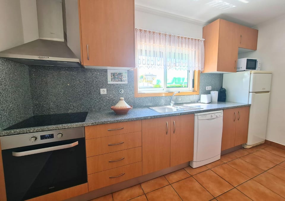 Kitchen or kitchenette, oven, stove