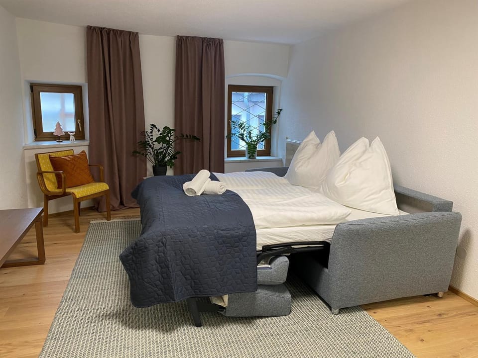 Bed, Seating area, Bedroom