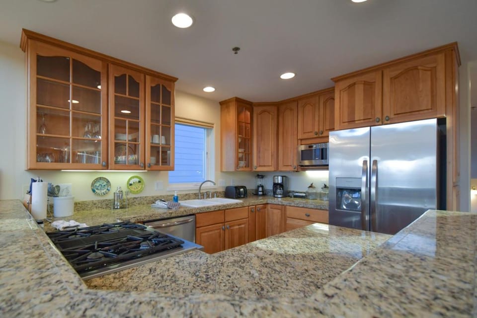 Kitchen or kitchenette, dishwasher, oven, stove, toaster