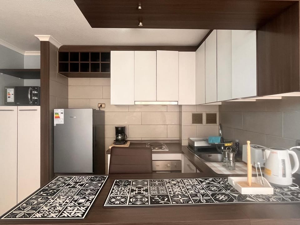 Kitchen or kitchenette, oven, toaster