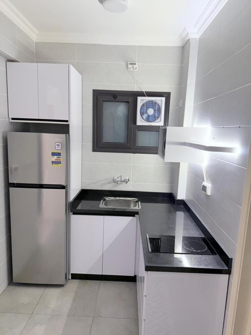Kitchen or kitchenette, stove
