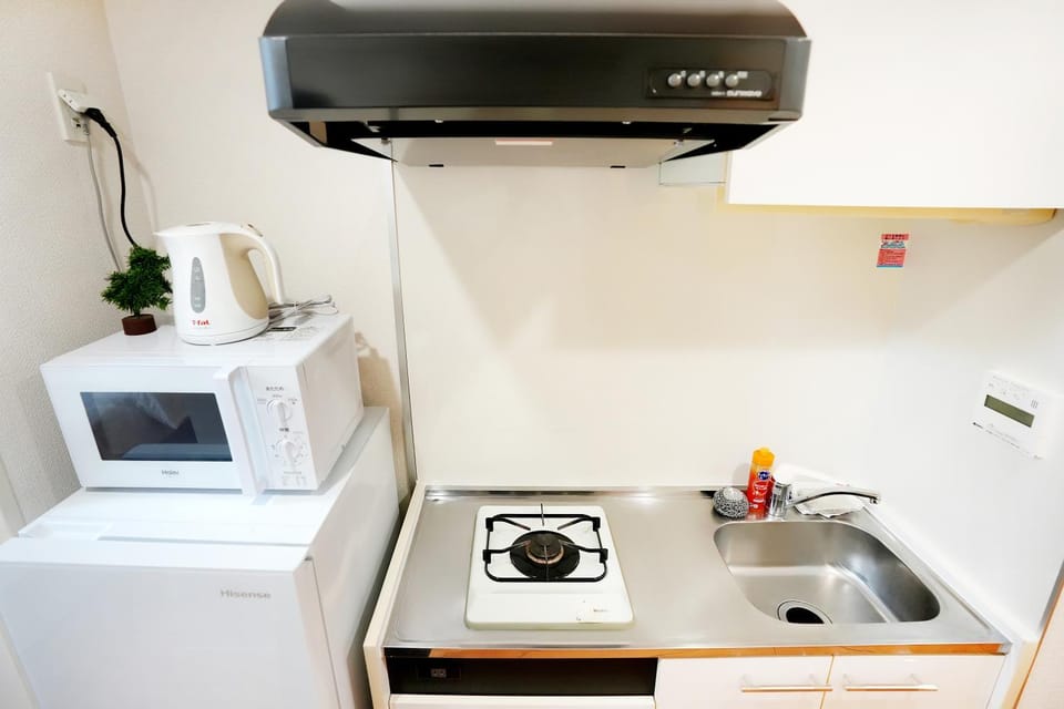 Kitchen or kitchenette, microwave