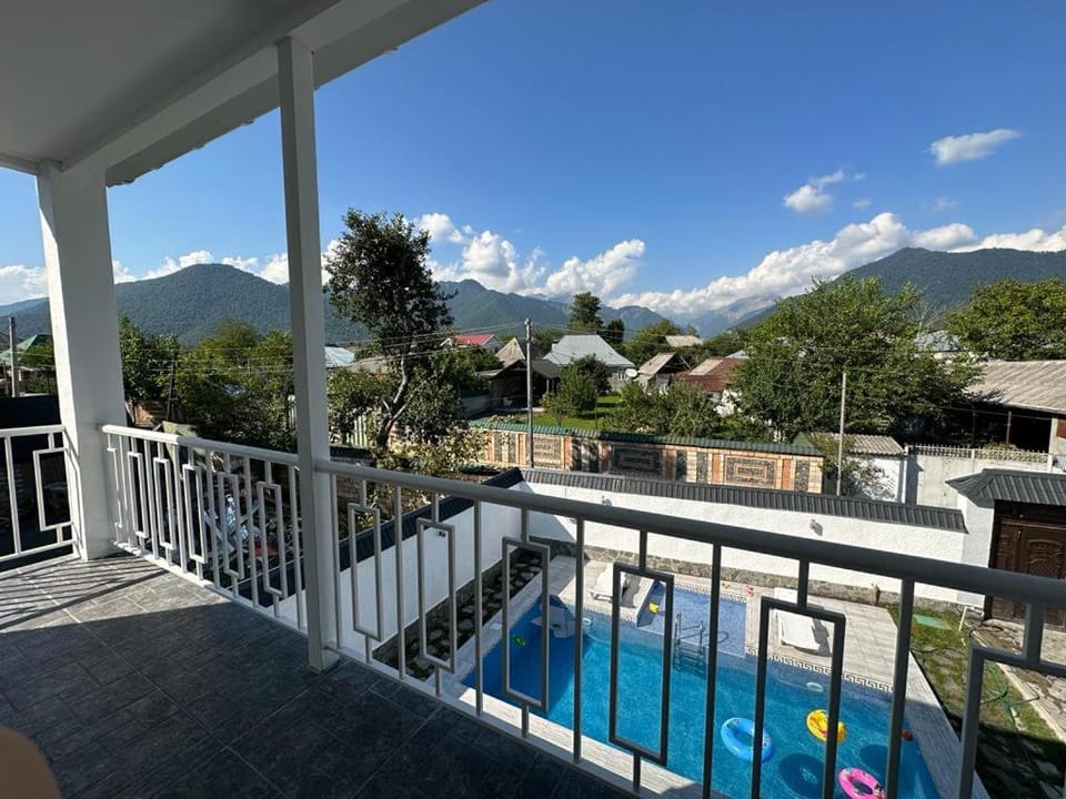 Property building, Patio, Spring, Day, Natural landscape, View (from property/room), Balcony/Terrace, Mountain view, Pool view, Swimming pool