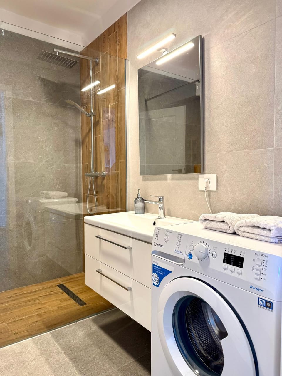 Bathroom, towels, washing machine, dryer