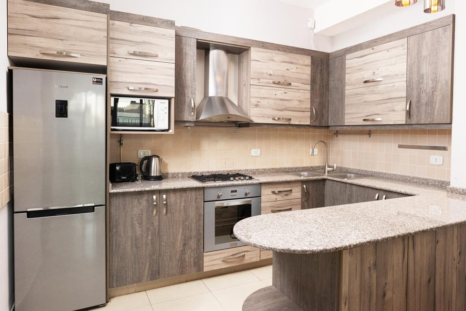 Kitchen or kitchenette, oven, stove
