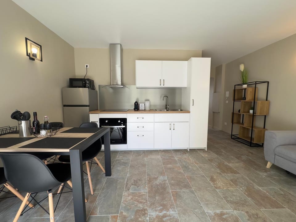Kitchen or kitchenette, Living room, Seating area, Dining area, oven, stove, toaster